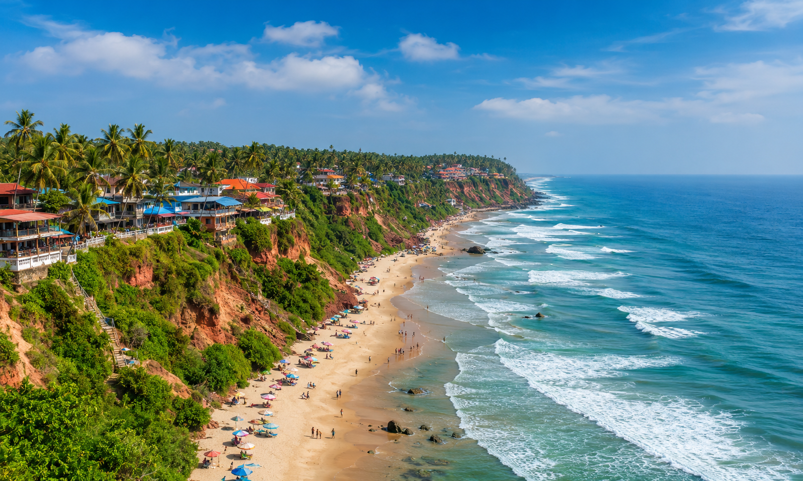 Varkala Cliff with red laterite soil and Arabian Sea waves